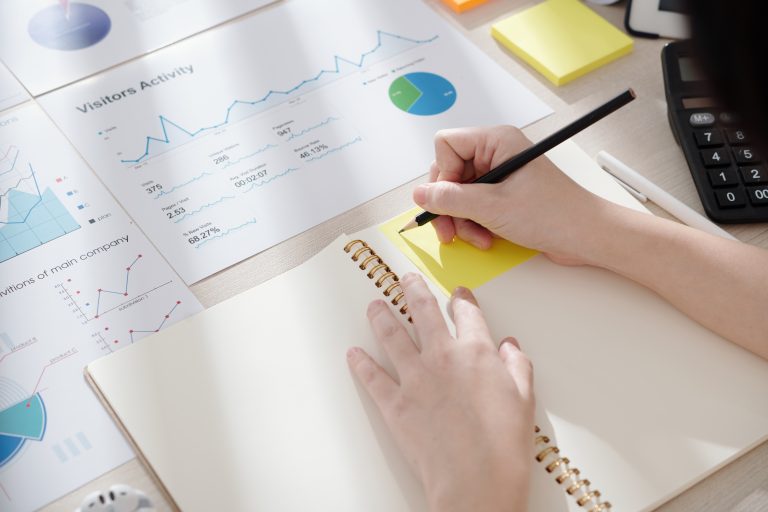 Business Person Writing Down Ideas